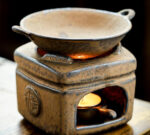 Massage oil warmer