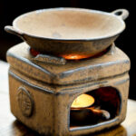 Massage oil warmer